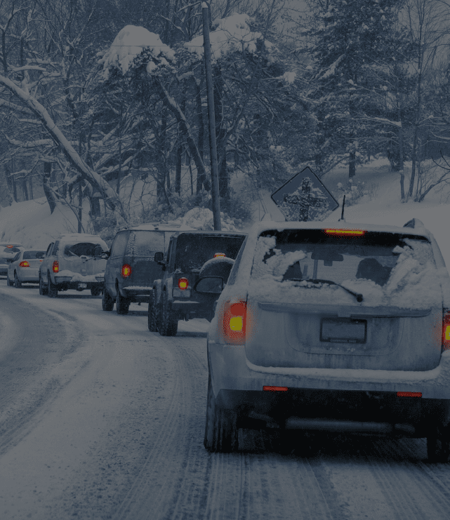 Traffic on a frozen, snowy road