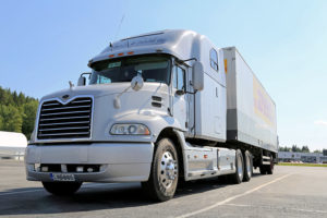 FORSSA, FINLAND - JULY 4 2015: Grey Mack Vision semi truck parked. Due to truck and trailer lenght regulations conventional Mack trucks are uncommon in Finland.