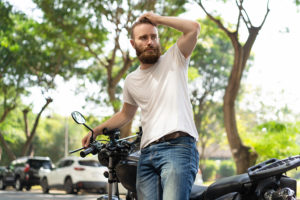 Dunedin Man Nervously In The Street Off Motorcycle