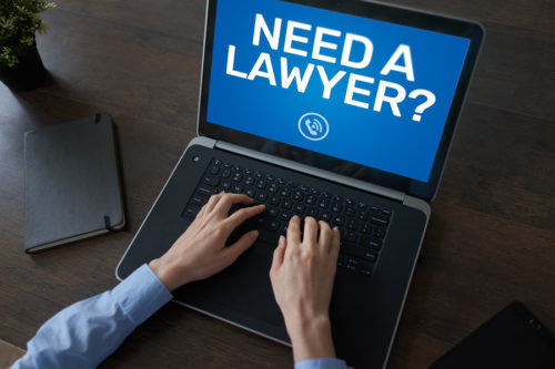 Florida Man Searching on Computer for A Personal Injury Attorney