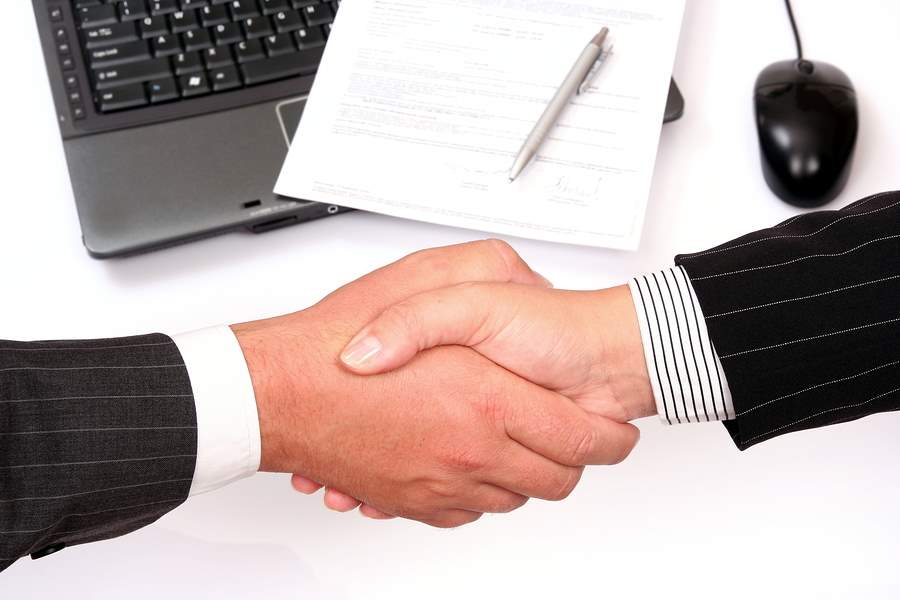 Personal Injury Lawyers Shake Hands in Tampa, Florida