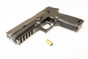 Sig Sauer P320 handgun pistol misfire injury lawsuit defective product liability lawyer Florida