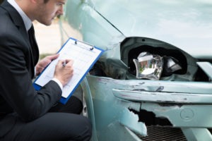 car insurance adjuster going over details of accident in washington state