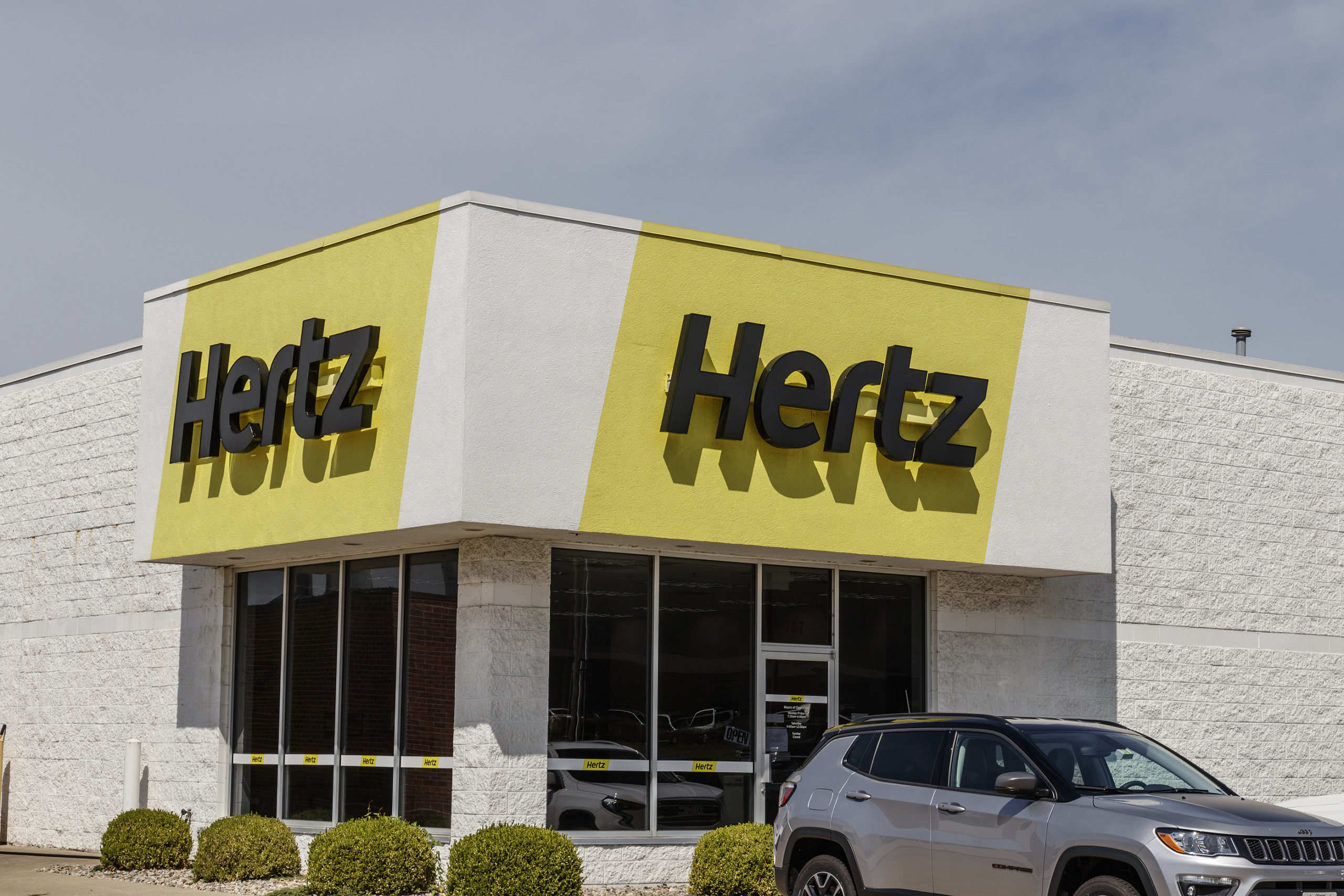 Hertz car rental wrongful arrest lawsuit attorney lawyer