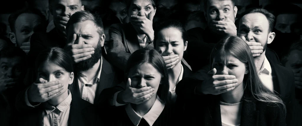 image of people with mouths covered representative of silencing victims - Dolman Law Group